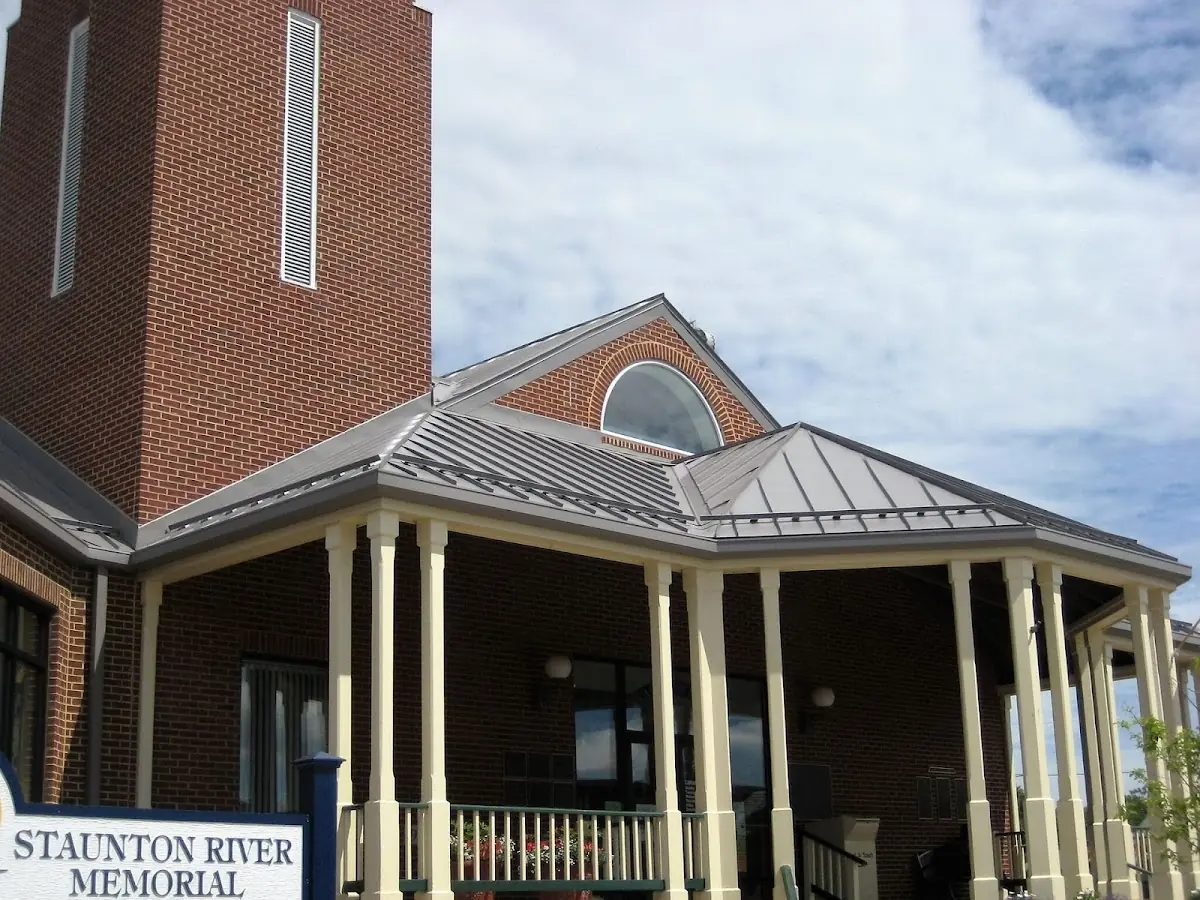 Skilled roofing craftsmen working on a residential roof in Norman